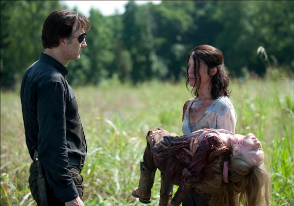 Lilly brings Meghan's body to Brian (The Governor) after she is bit.