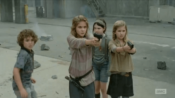 Lizzie (left) and Mika (right) save Tyresse. Carol would be so proud
