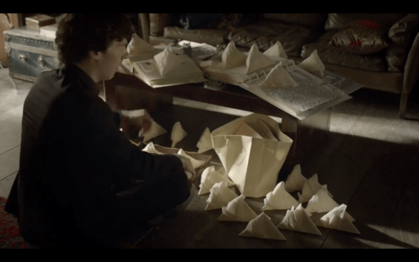 Sherlock instantaneously folds a slew of napkins into the Sydney Opera House. Nervous much?