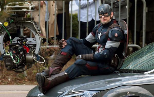 Look at that Avengers 'A' on left shoulder of Captain America's few costume!
